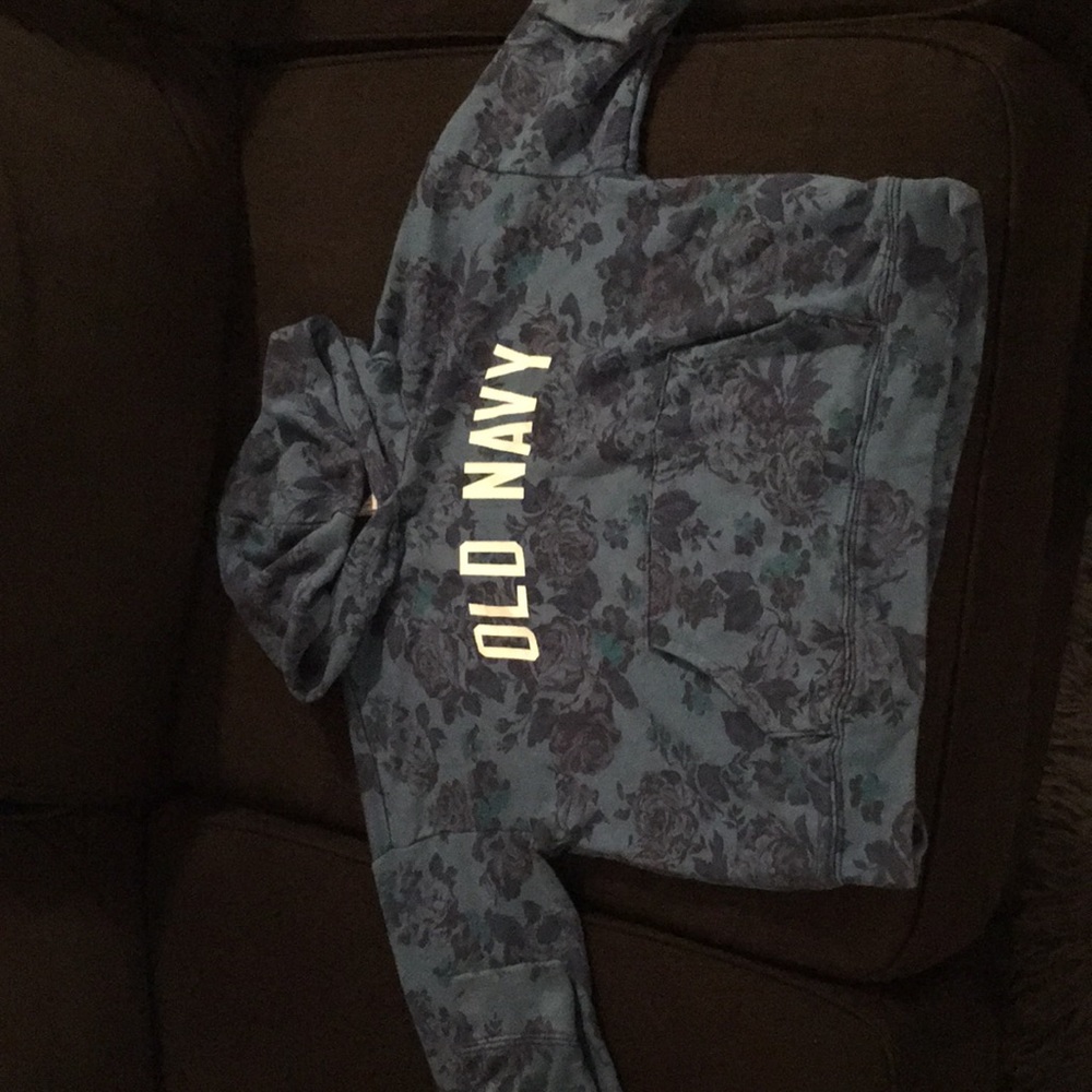 A blue old navy sweatshirt .